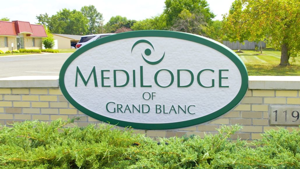 Medilodge of Grand Blanc Sign in front of the building.